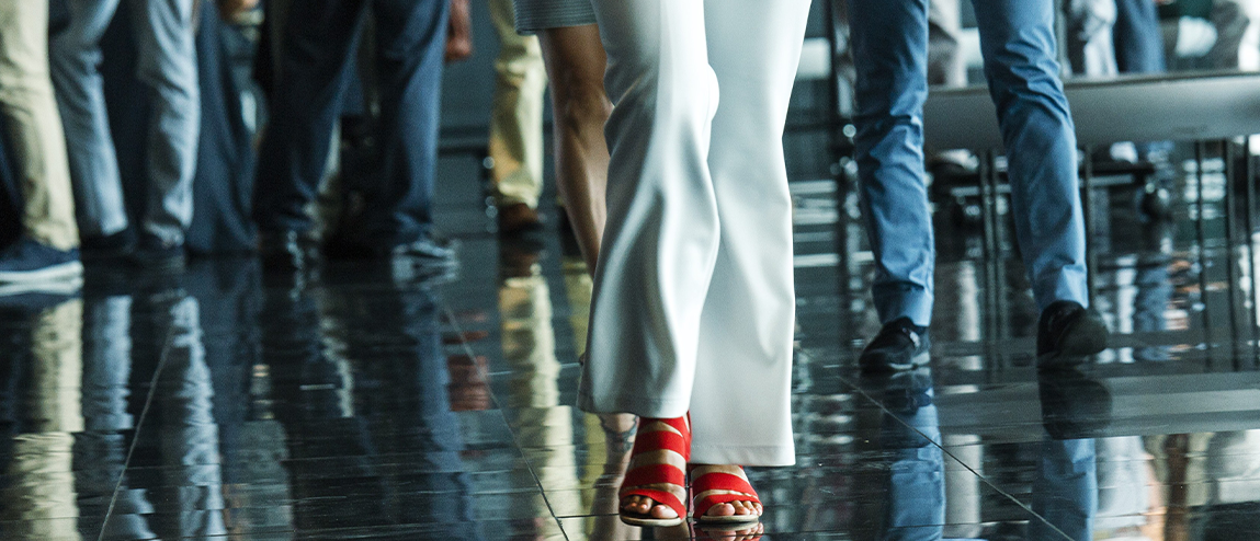 Professionals walking at a Ferrer event on the PAA expanded access to medicines program.